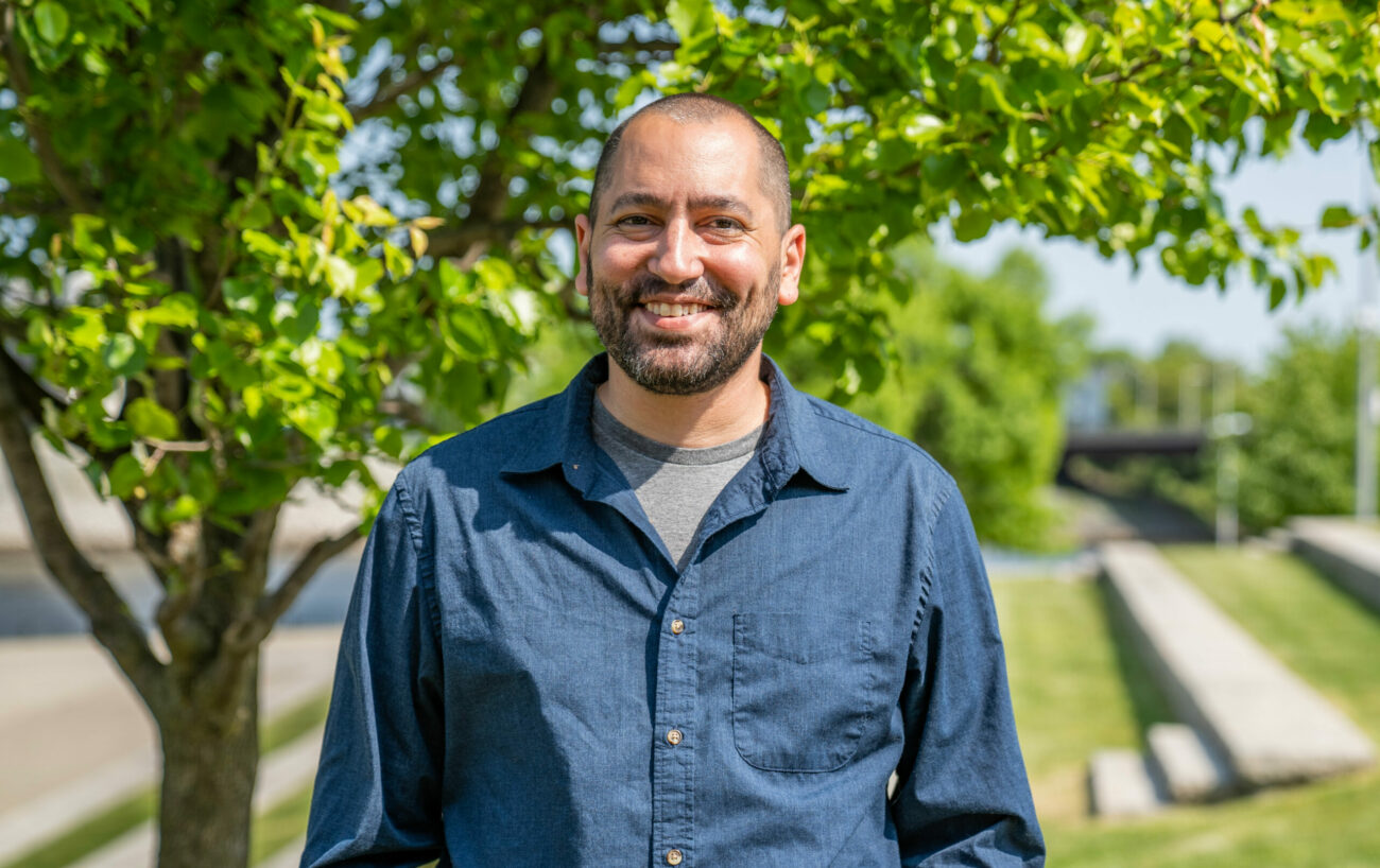 Aaron Vera smiling and standing in Riverfront Park